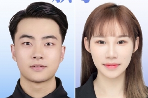 成都世运会中国代表团旗手：轮滑运动员郭丹和技巧运动员史经纬